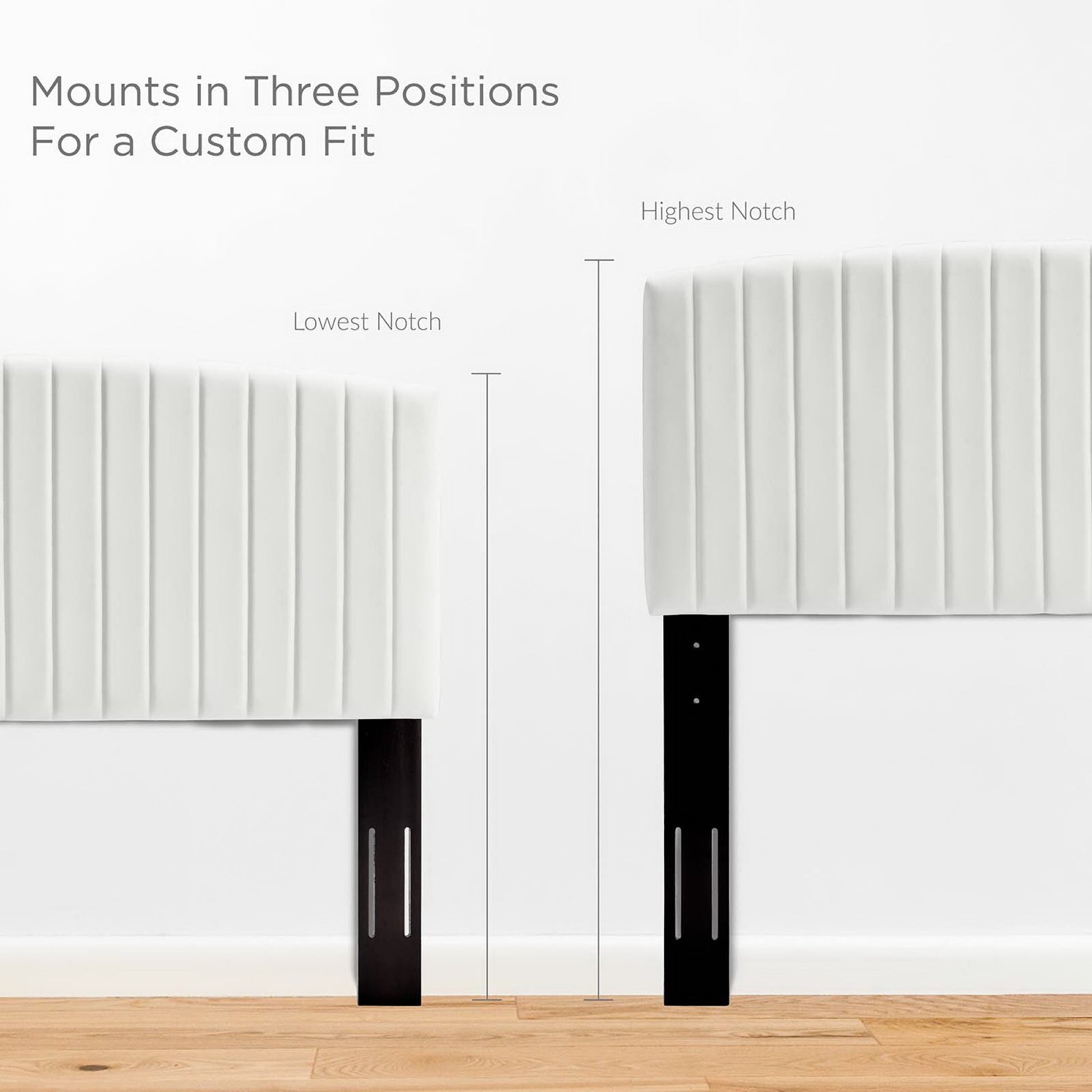 White padded panel atop black steel legs; adjustable three-position mounts for a custom fit.