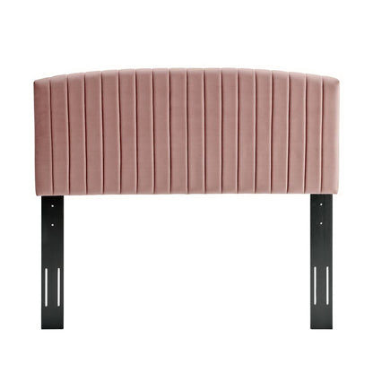 Dusty rose velvet headboard with vertical channel quilting and black metal adjustable legs.