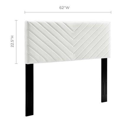 White velvet headboard with angular channel tufting, mounted on black rectangular legs; 62W x 22.5H.