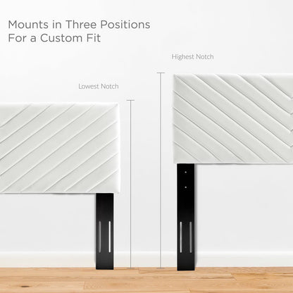 White quilted panels on black adjustable mounts for a headboard, shown in three notch positions for a custom fit.