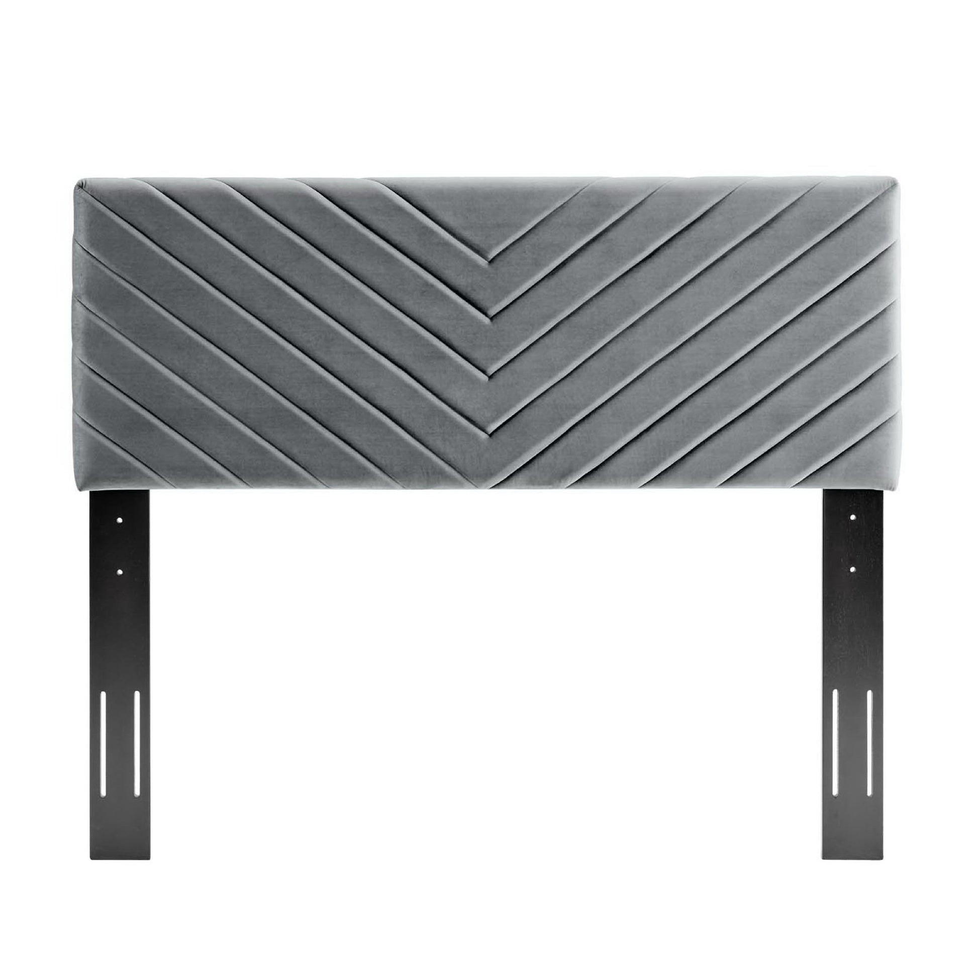 Gray upholstered rectangular headboard panel with angular channel tufting and black metal mounting brackets.