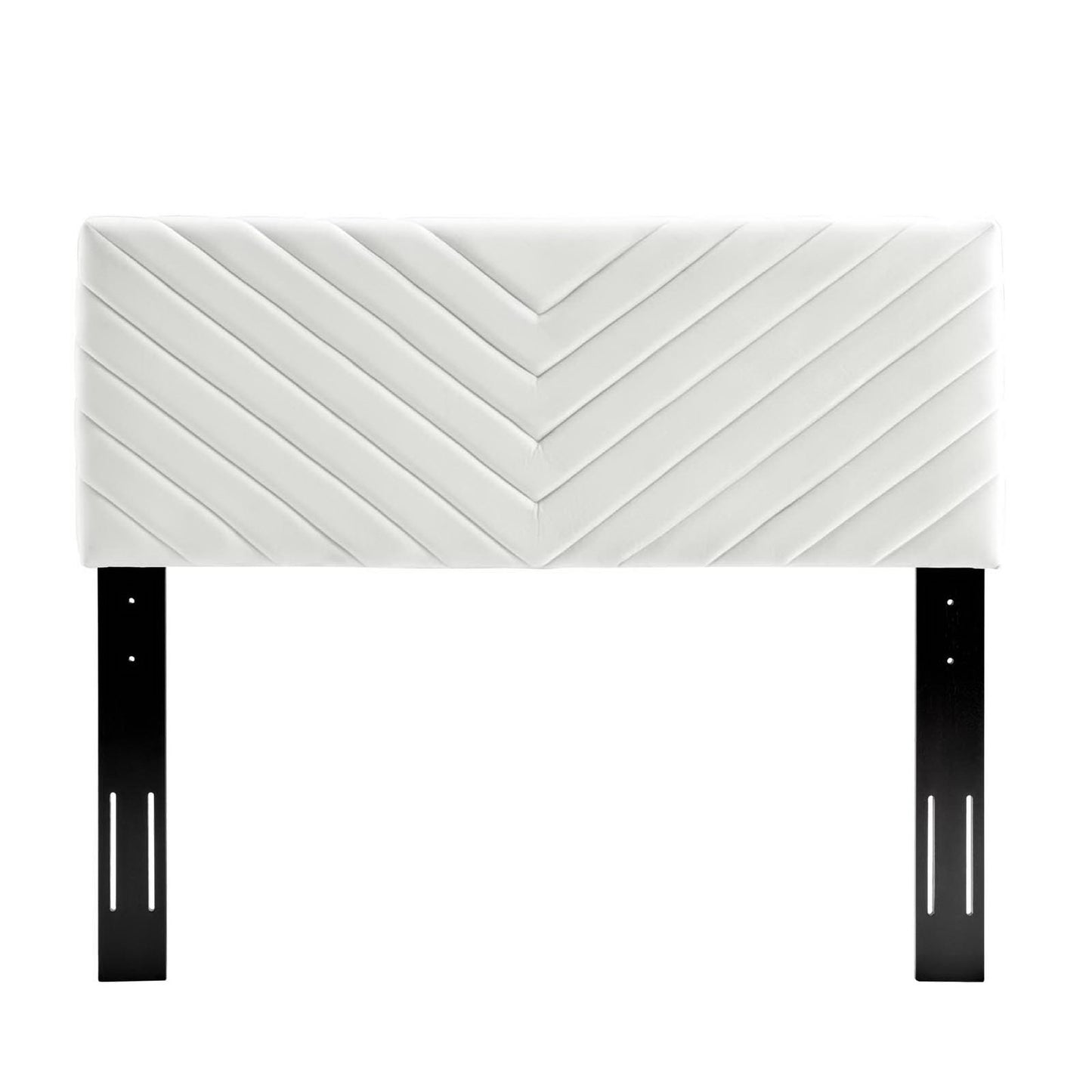 White padded headboard with angular channel tufting, upholstered in velvet, supported by black metal legs with slotted holes.