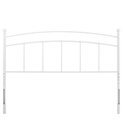 White metal headboard with curved arch top, vertical bars and round finial posts for a chic vintage bed.