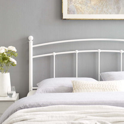 White metal queen headboard with a curved top and round finials.