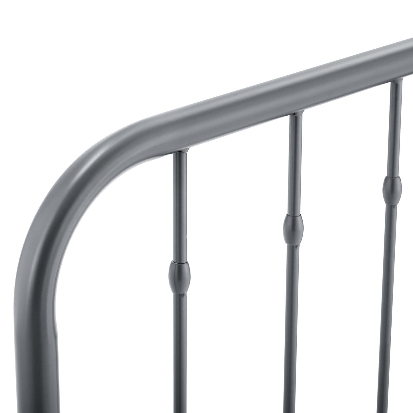Gray metal full headboard with curved top rail and slim vertical spindles; modern industrial style.