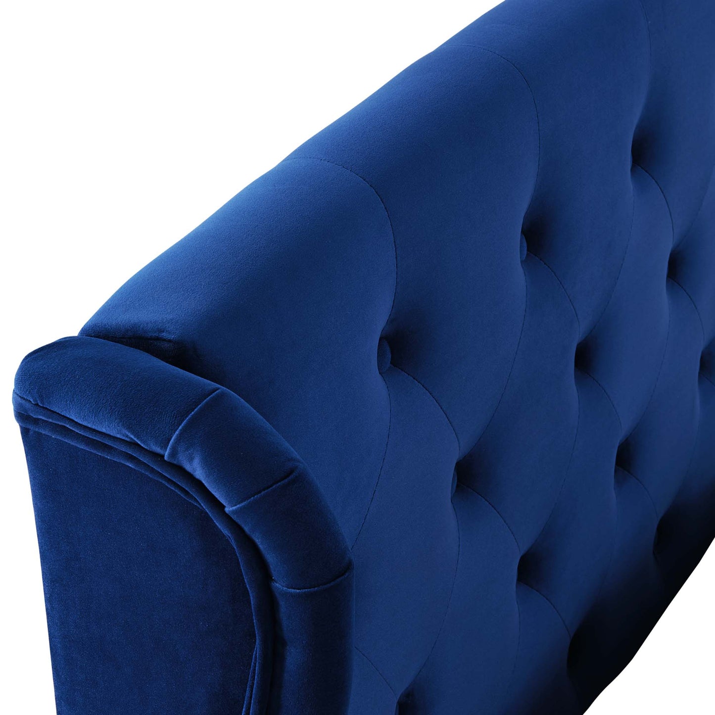 Blue velvet tufted wingback platform bed with a button-tufted headboard.