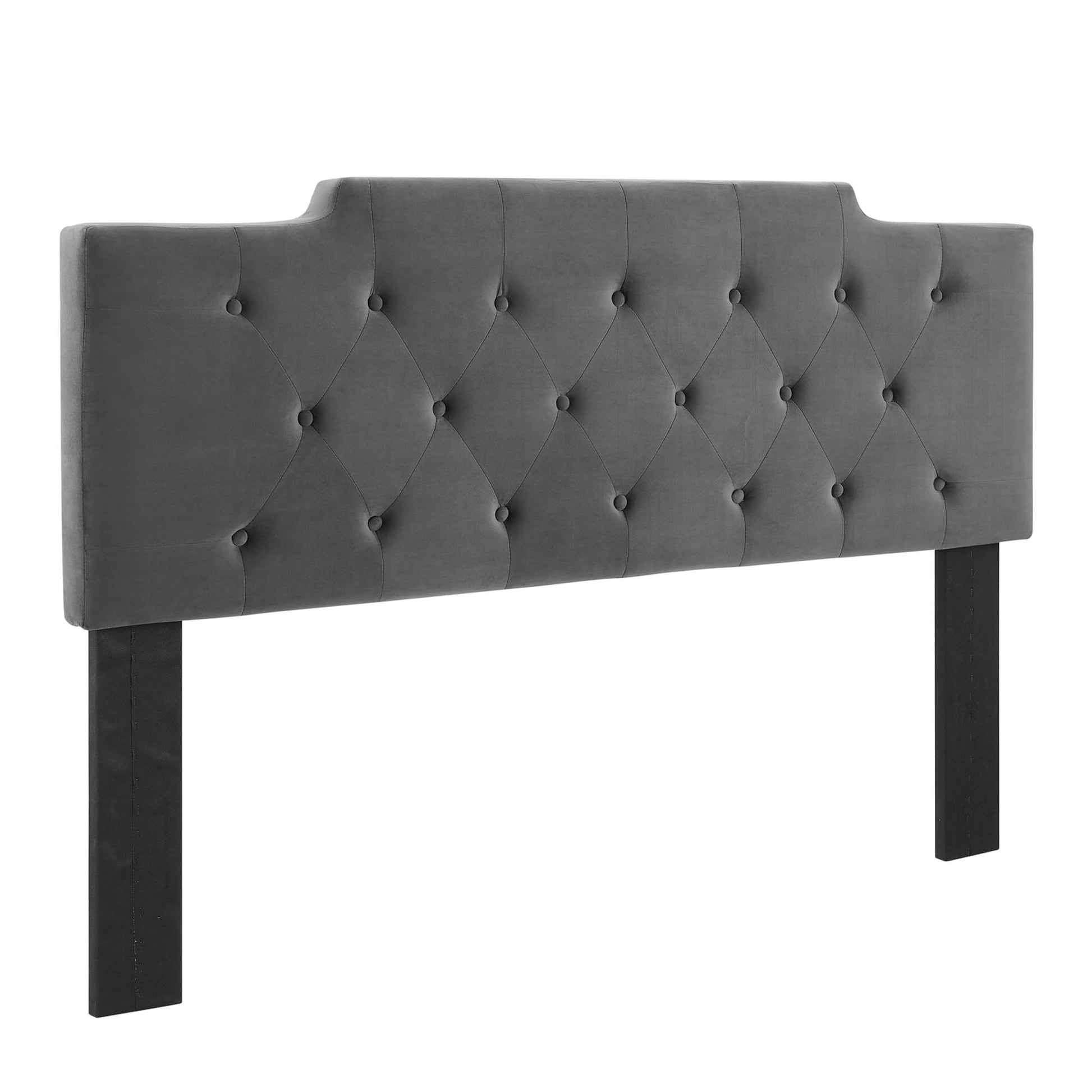 Charcoal velvet upholstered headboard with diamond tufting, button accents, and dark wood legs.