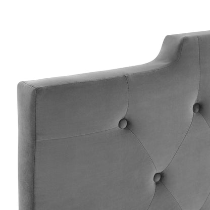 Gray velvet tufted headboard with diamond stitching and round fabric buttons, curved edge.
