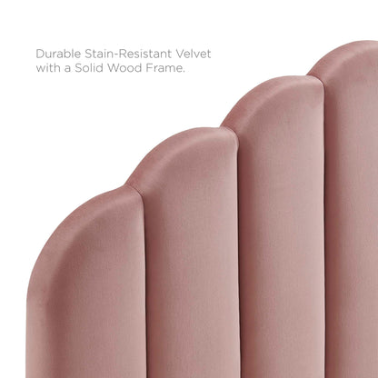 Dusty red velvet with curved vertical panels; plush upholstery on a solid wood frame for a modern headboard.