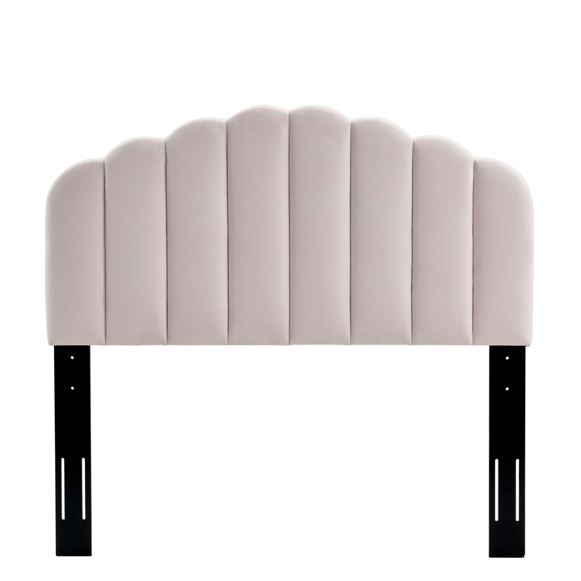 Red velvet tufted twin headboard with scalloped arches and black metal legs.