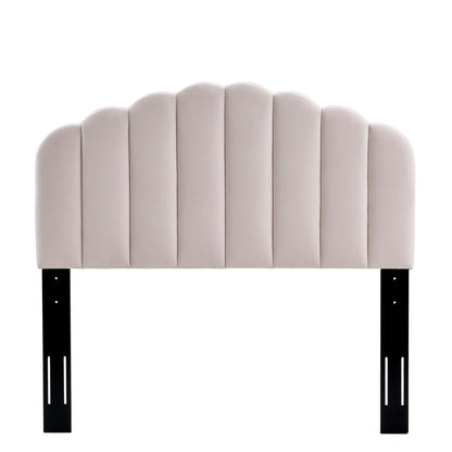 Red velvet tufted twin headboard with scalloped arches and black metal legs.