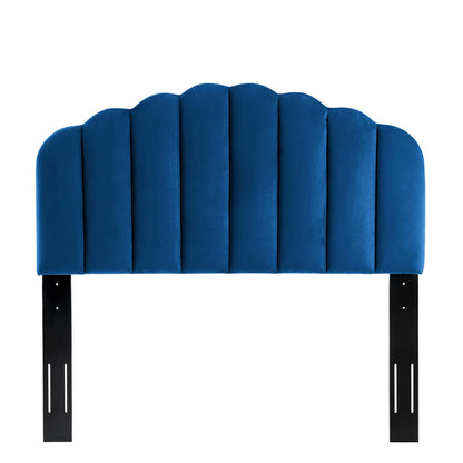 Navy blue padded scalloped headboard with black metal mounting brackets.