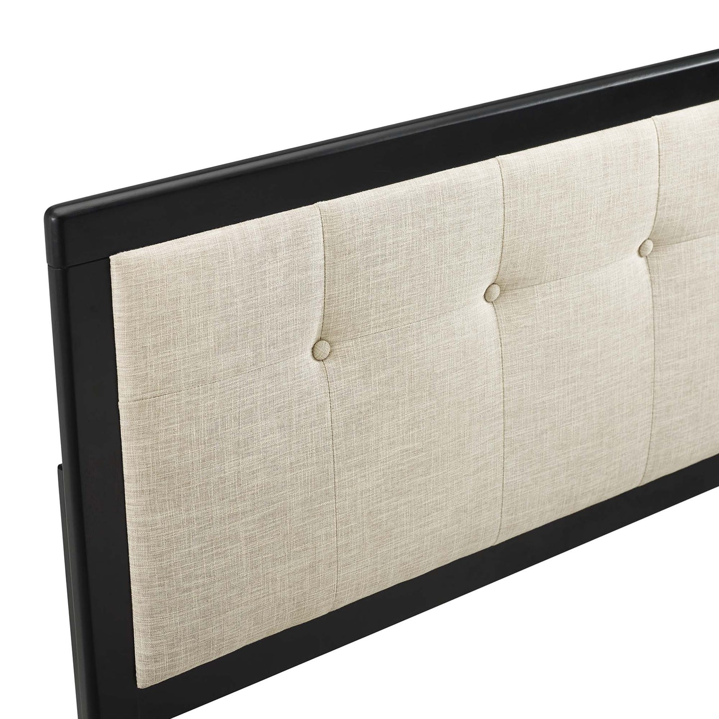 Black-framed king headboard with beige linen upholstery and button-tufted panels.