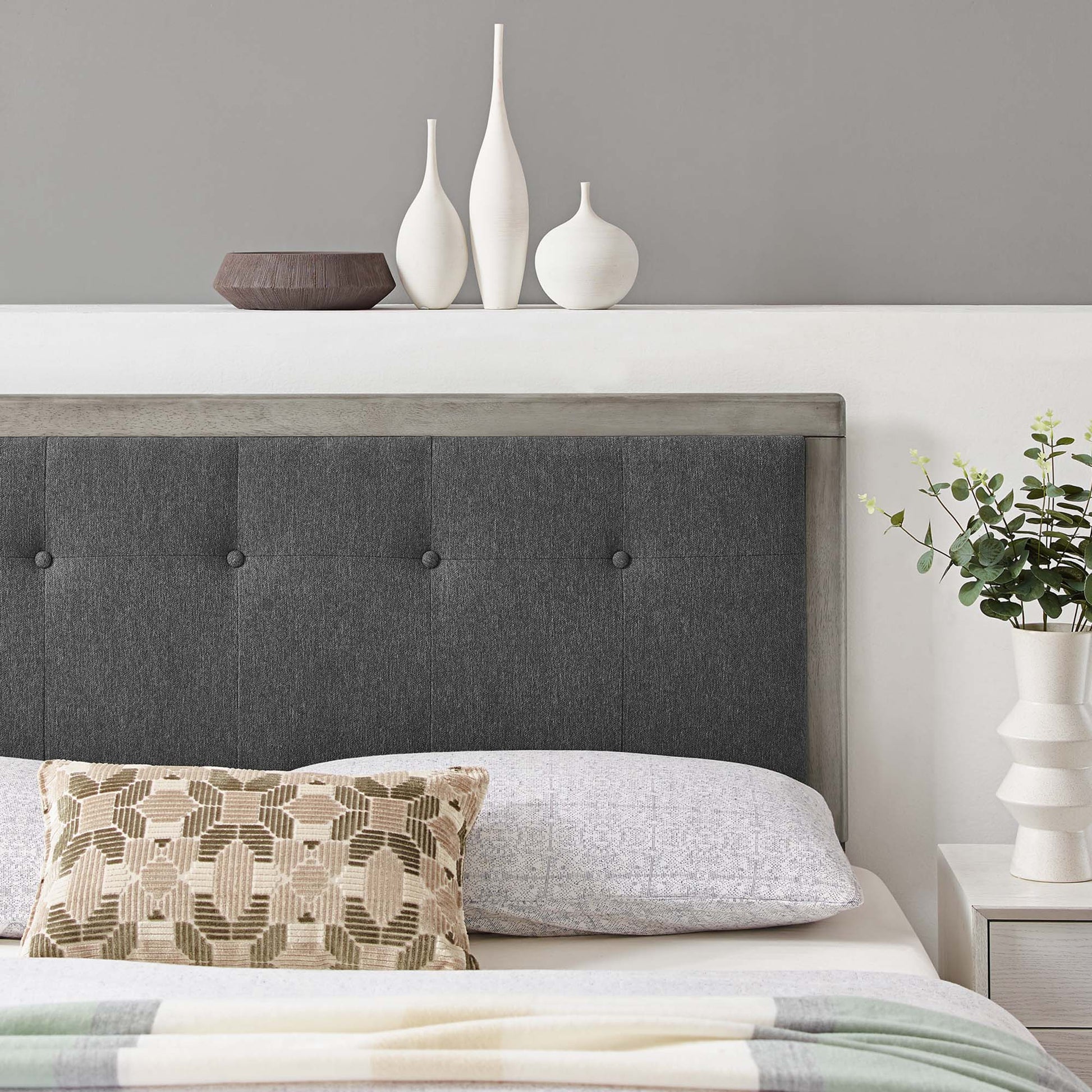 Tufted gray fabric headboard with wood trim (king size).