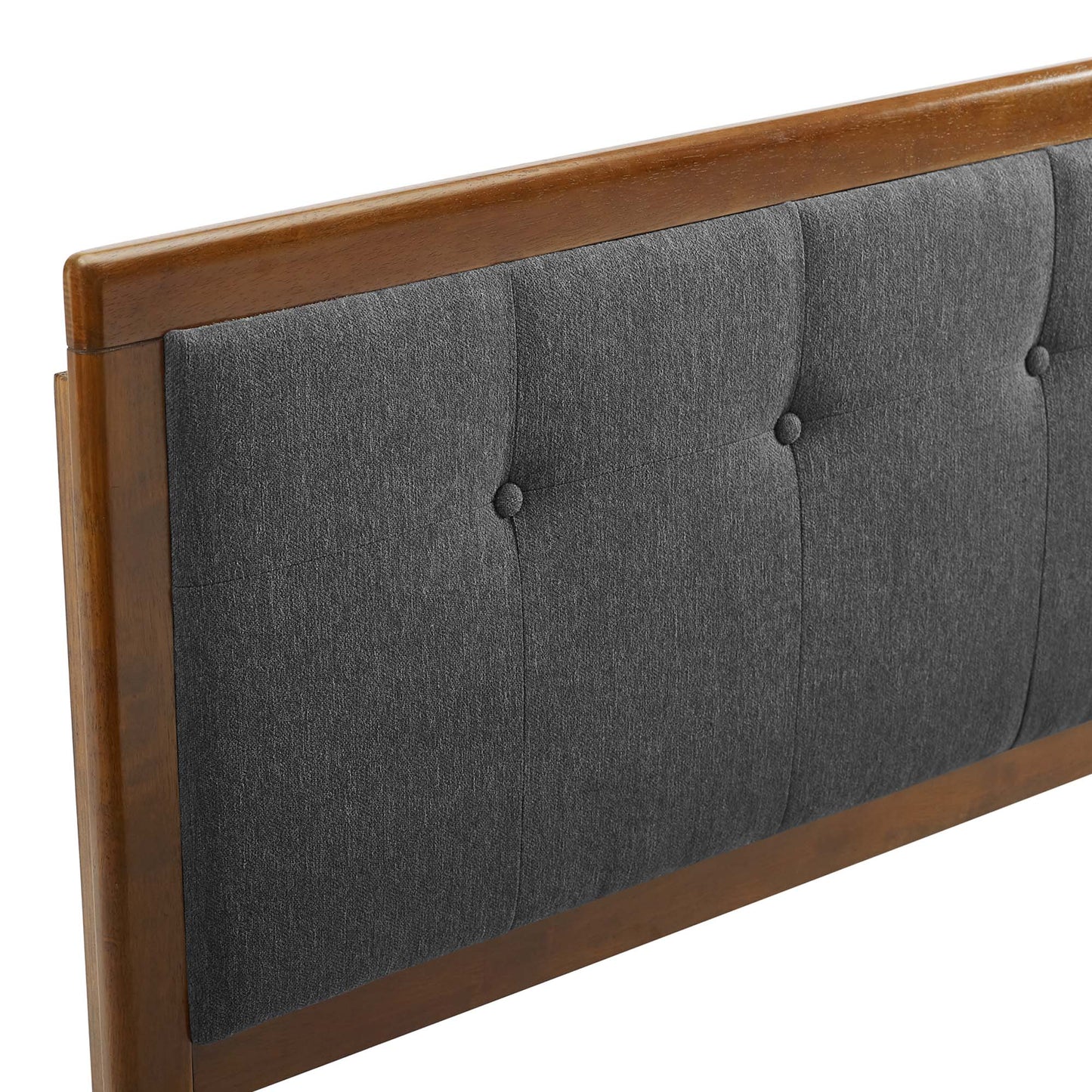 King headboard with black tufted fabric panel and wood frame featuring button tufting.