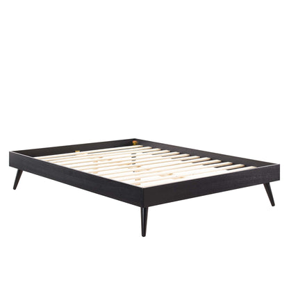 Black low-profile king platform bed frame with natural wood slats and tapered legs, mid-century modern style.