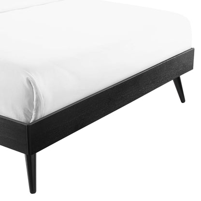 Mid-century black wood grain platform bed frame with tapered legs.