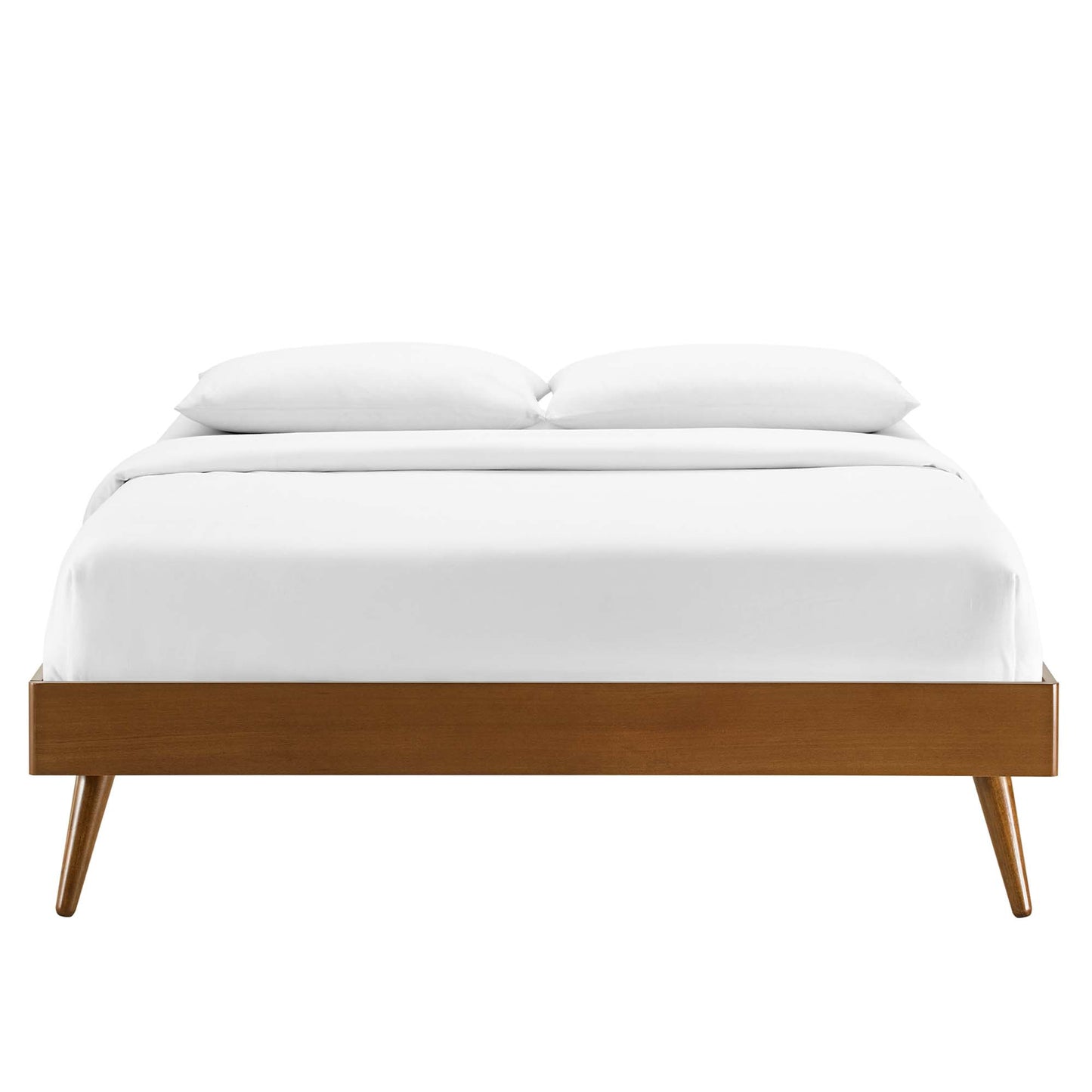 Walnut wood platform bed with tapered legs, white bedding and two pillows