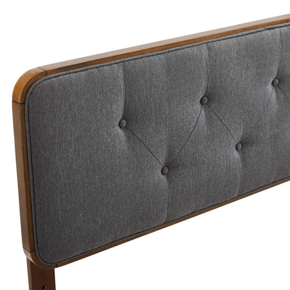 Walnut-wood-framed black tufted fabric headboard with diamond button tufts, mid-century modern style.