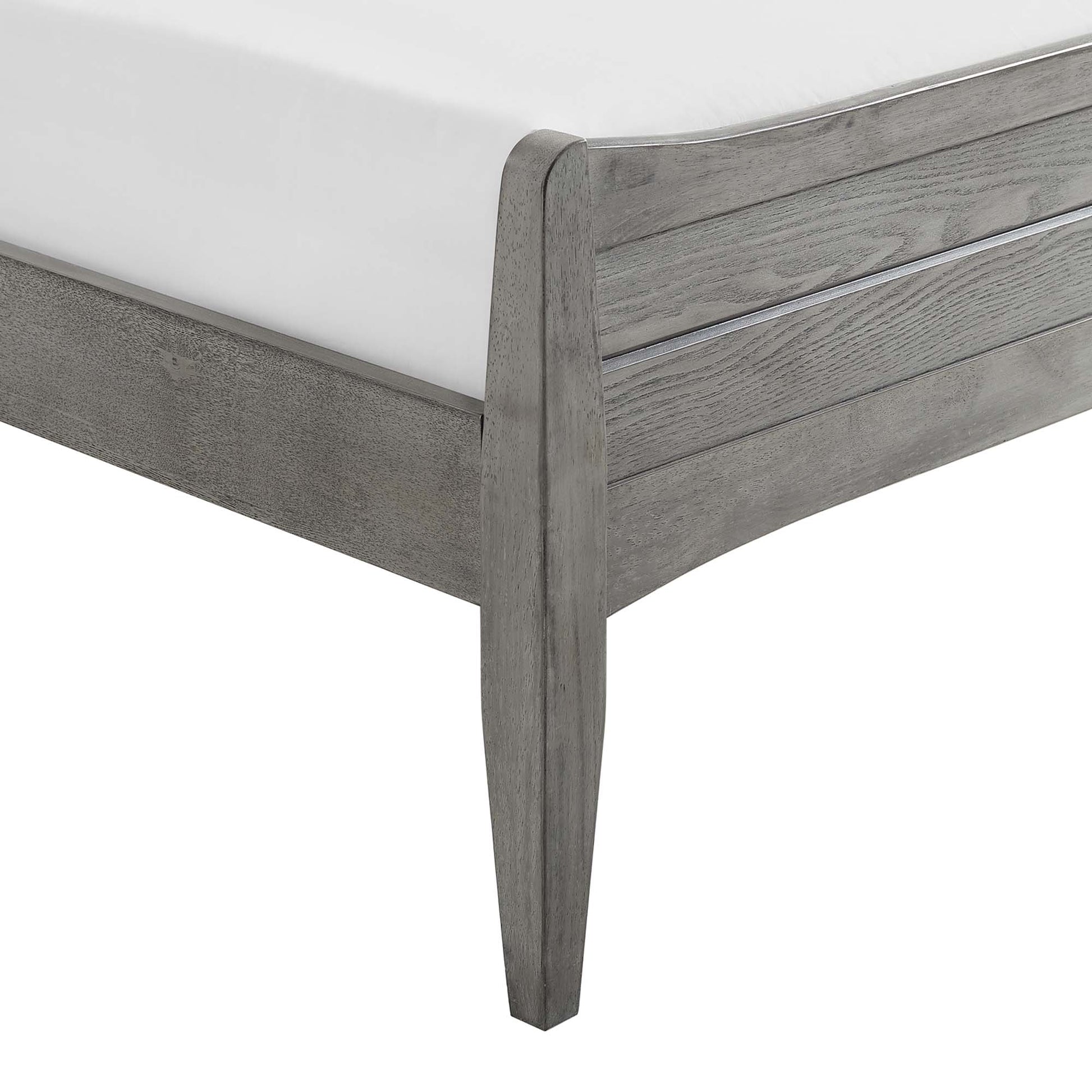 Weathered gray wood king platform bed frame with tapered leg and horizontal slat footboard, white mattress.