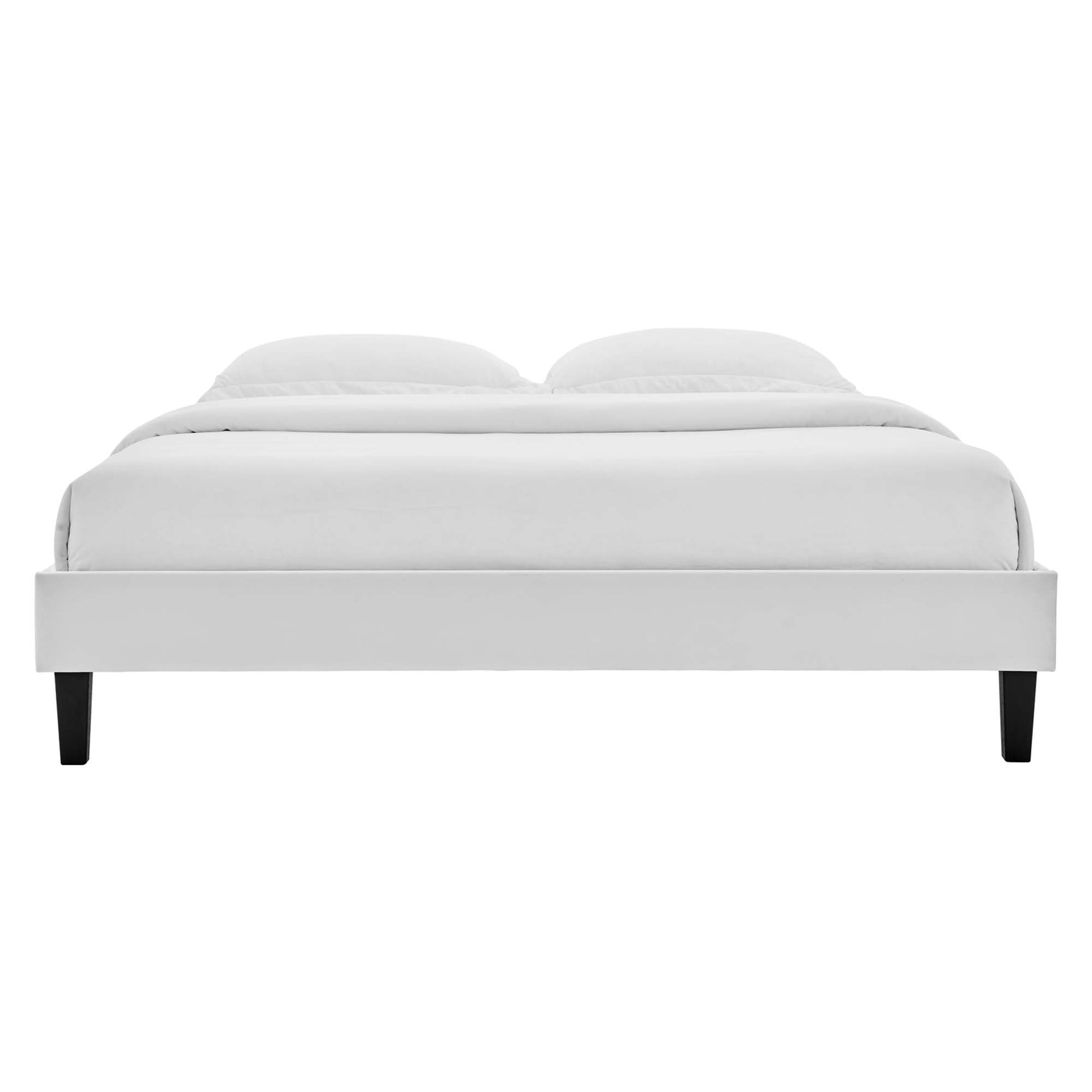 Gray velvet twin platform bed frame with a low-profile silhouette, black tapered legs, and white bedding.