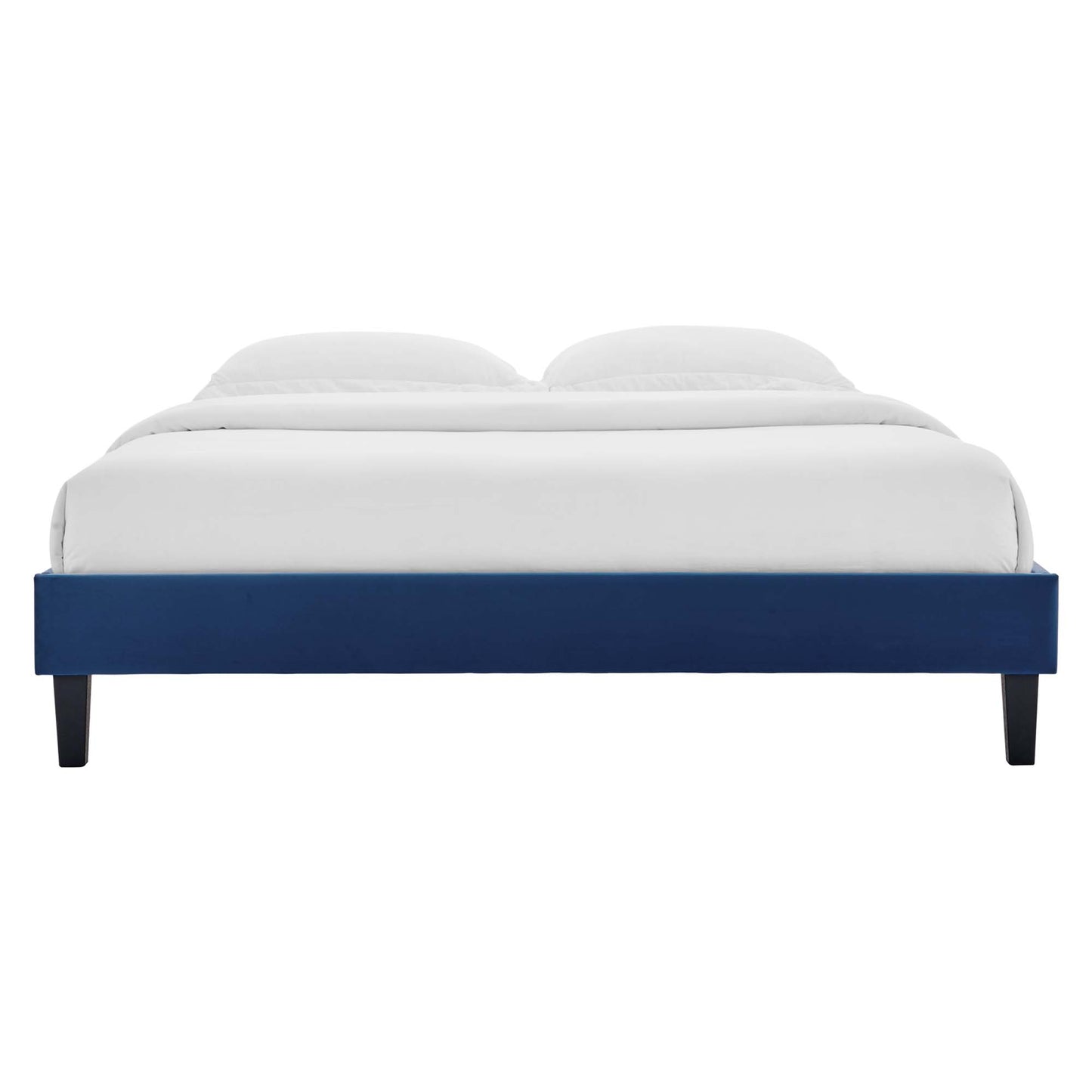 Navy blue platform bed frame with white bedding and two pillows; sleek modern frame with black tapered legs.