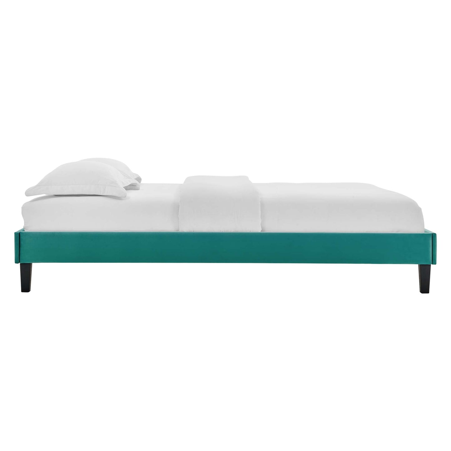 Teal upholstered platform bed frame with black tapered legs, white mattress and pillows.