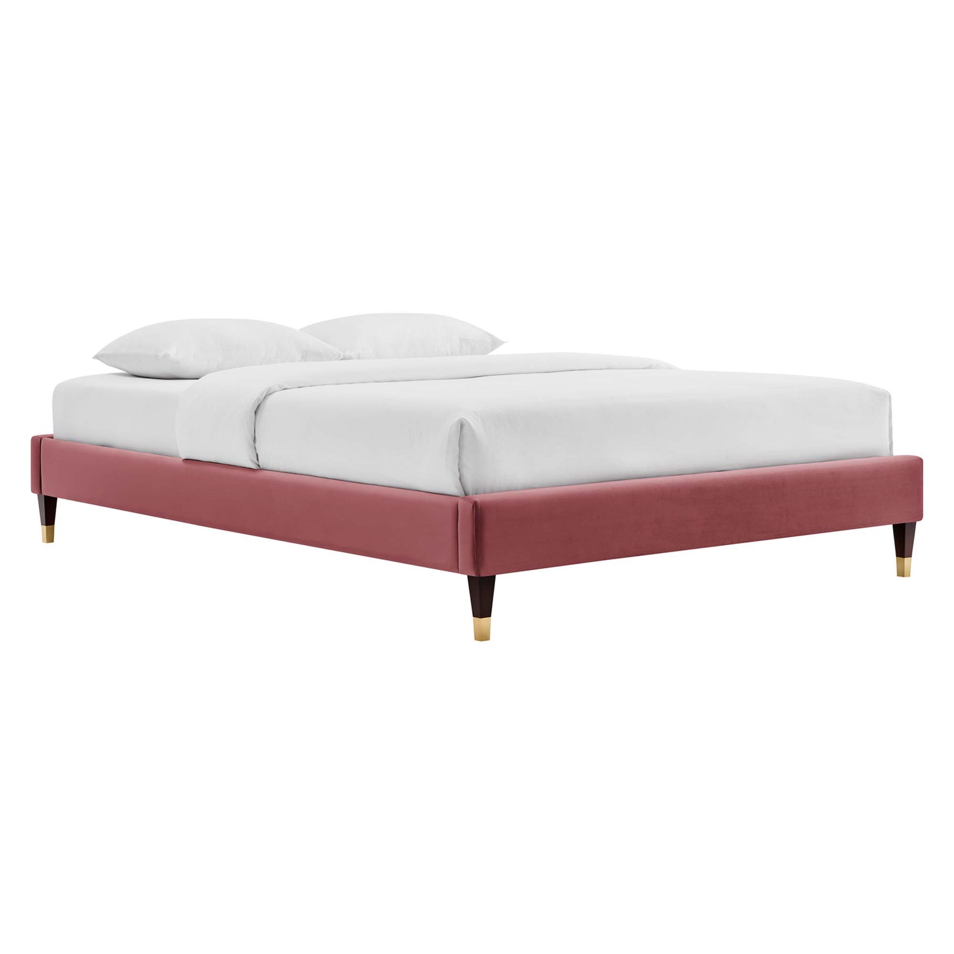 Red velvet low-profile upholstered queen platform bed with gold-tipped legs and white bedding.