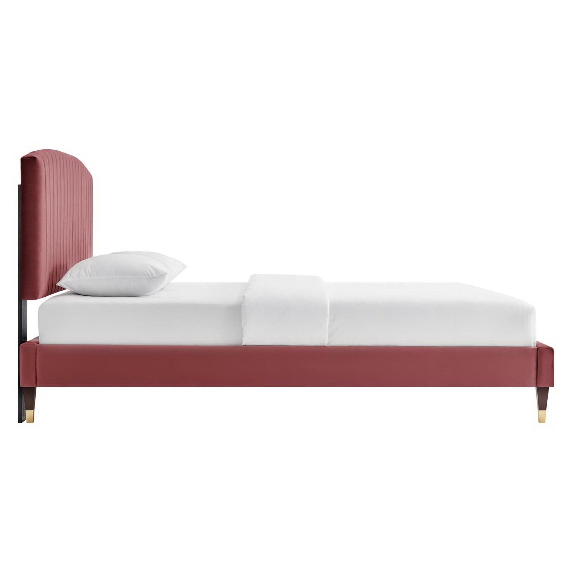Burgundy upholstered platform bed with a tall curved headboard, low rails, black supports, gold-tipped legs, and white bedding.