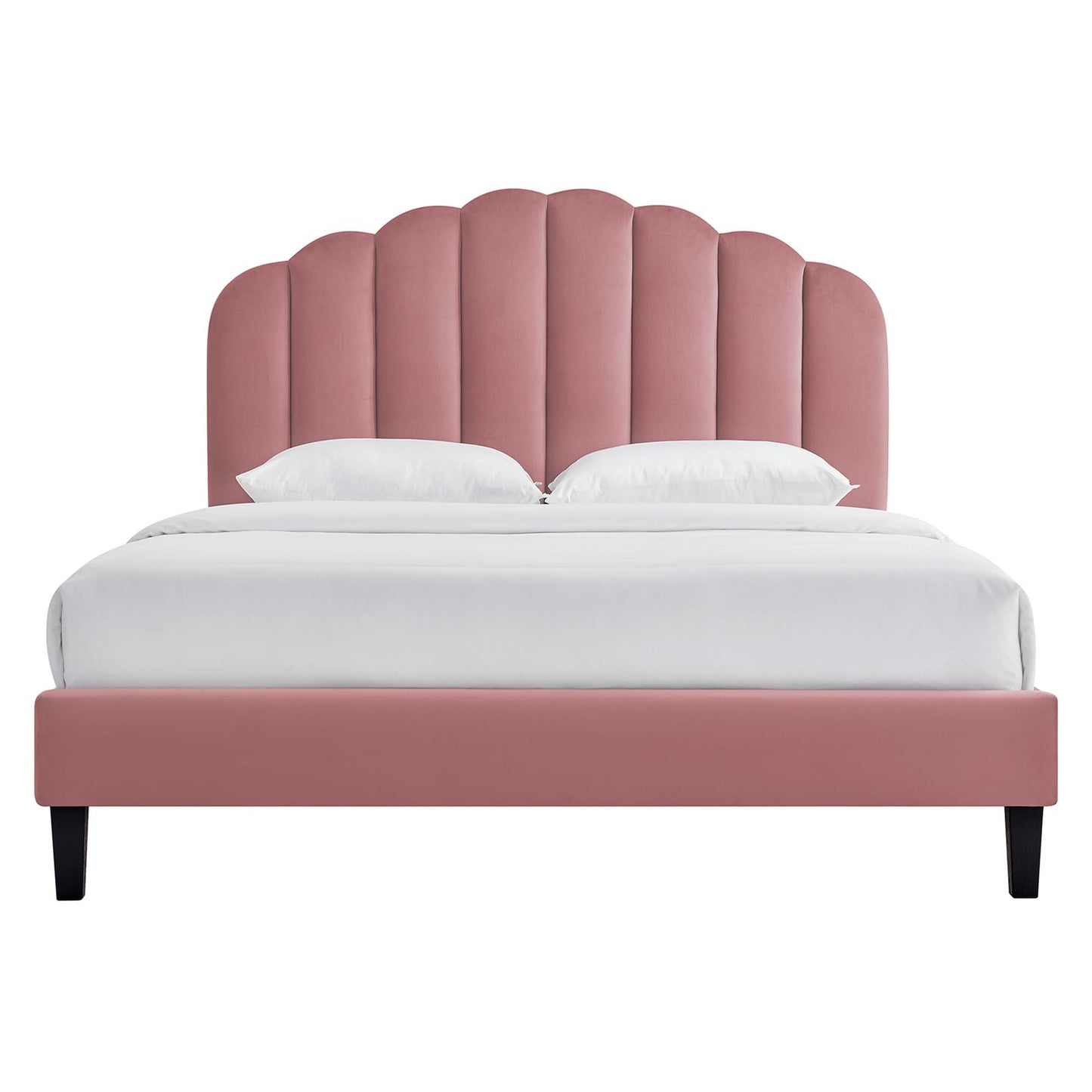 Red velvet queen platform bed with a scalloped arched headboard, white linens, and black tapered legs.