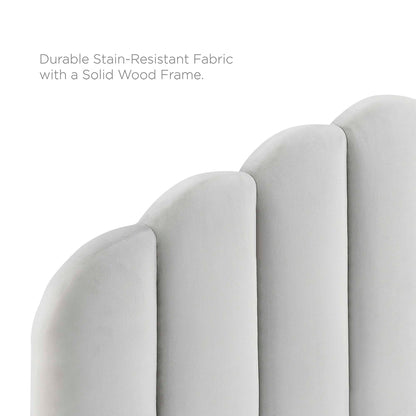 Light gray, stain-resistant performance velvet on a curved, vertically segmented upholstered headboard with a solid wood platform bed frame.