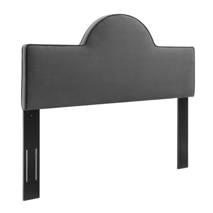 Dark gray velvet upholstered headboard with rounded central arch and slim black metal legs for bed mounting.