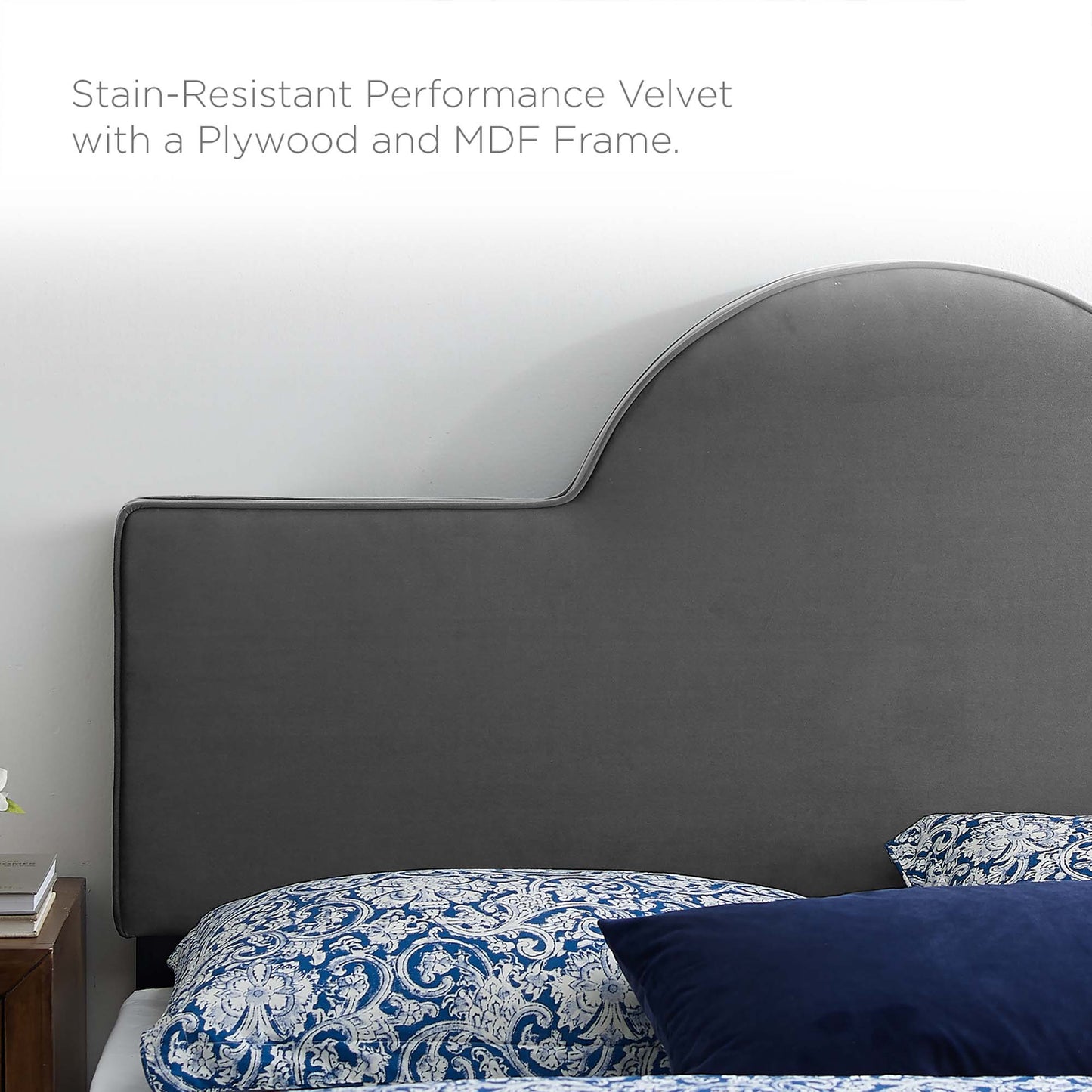 Charcoal stain-resistant velvet headboard with curved top and plywood/MDF frame; shown with blue patterned bedding.