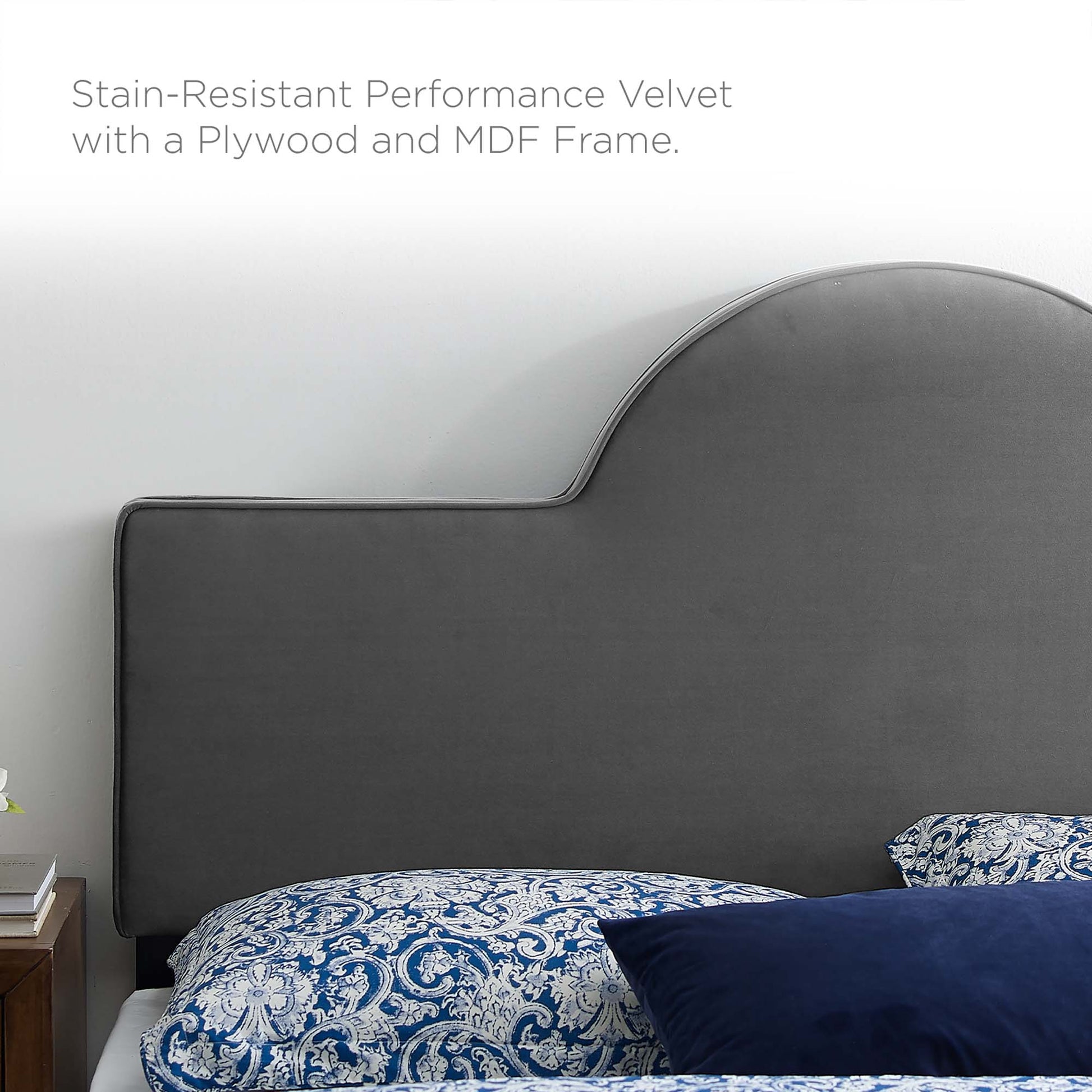 Charcoal stain-resistant velvet headboard with curved top and plywood/MDF frame; shown with blue patterned bedding.