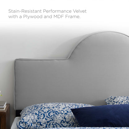 Gray performance velvet twin headboard with curved, padded design.
