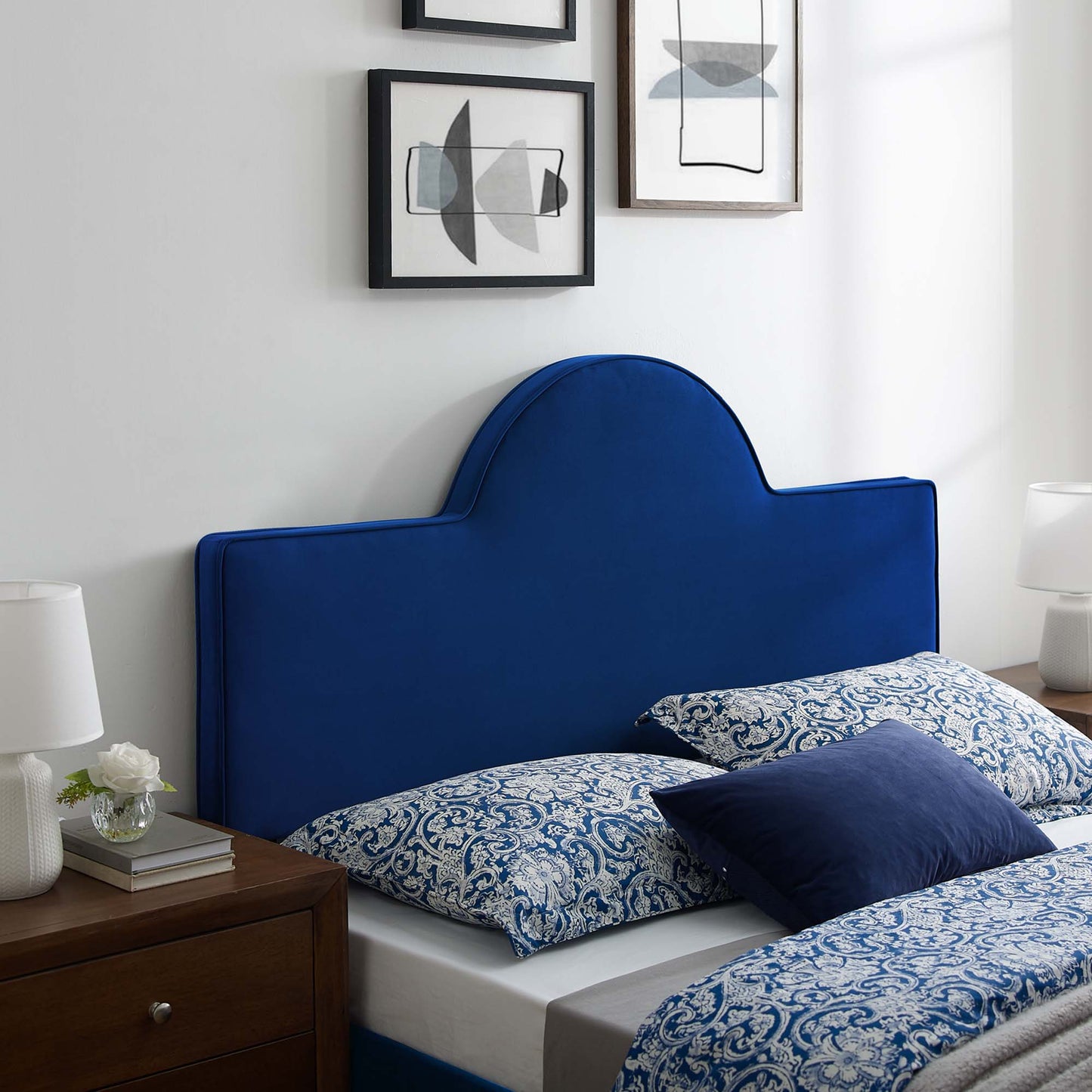 Navy blue velvet upholstered headboard with a curved cloud silhouette, full/queen size.