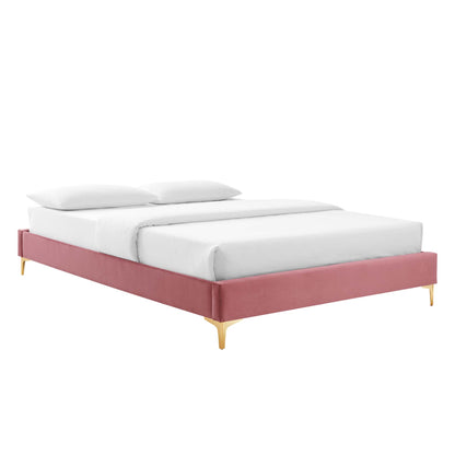 Red upholstered full bed frame with gold-tone legs, white bedding, and two pillows.