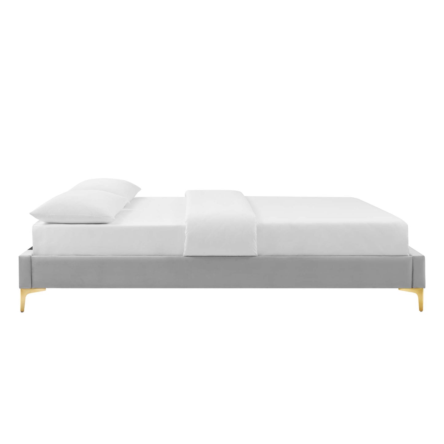 Light gray fabric platform bed with clean lines, white bedding and pillows, and gold-tinted tapered legs.