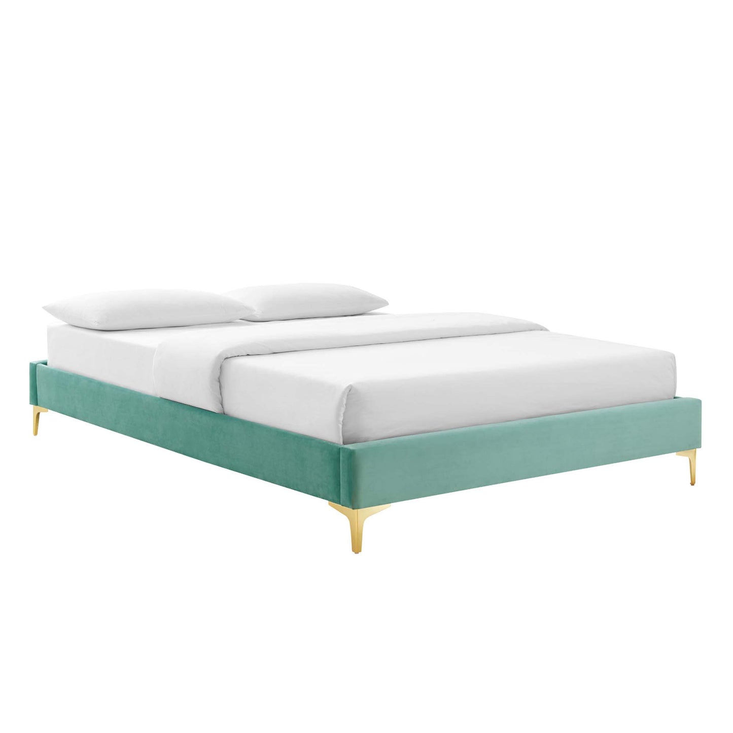 Mint green upholstered platform bed with gold-tone legs, modern low-profile design, white mattress and pillows.