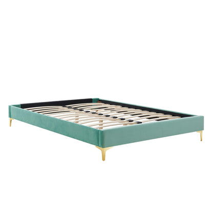 Mint velvet king bed frame with gold tapered legs, black back trim, and wooden slat base.