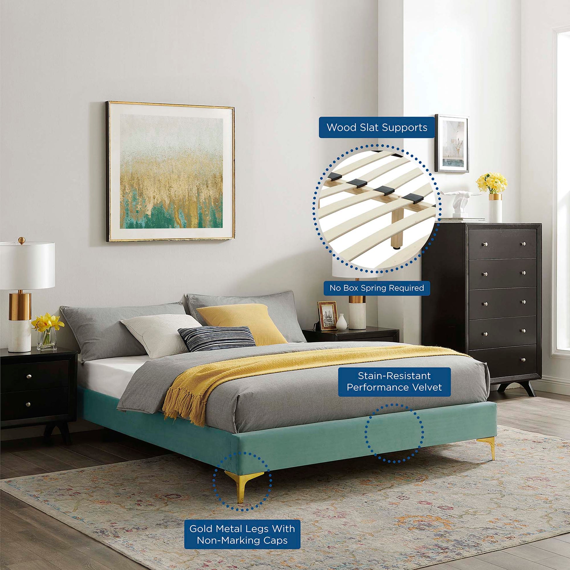 Mint green velvet king bed frame with gold legs and wood slat supports in a modern gray bedroom with yellow accents.