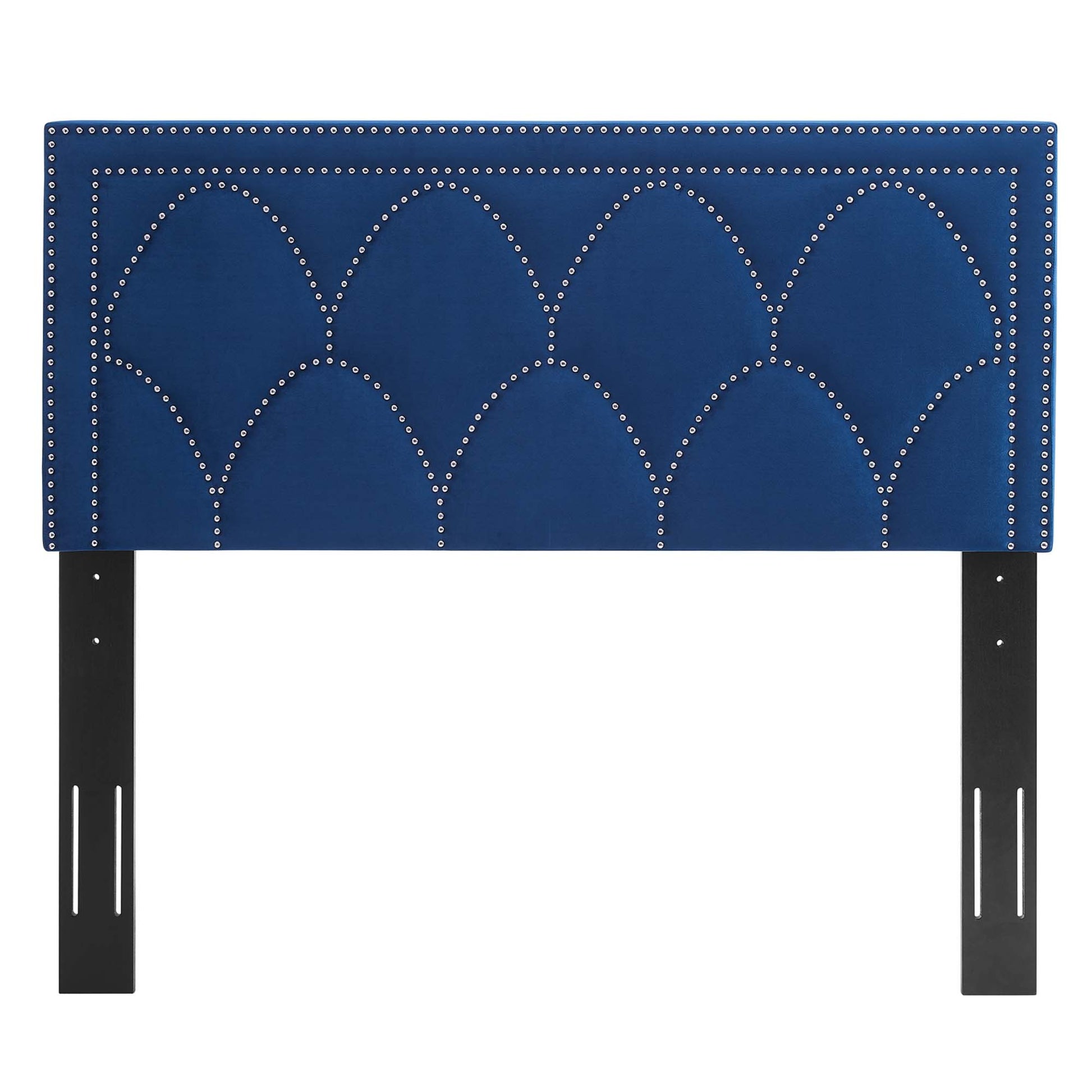 Navy upholstered headboard with silver nailhead trim in scalloped arches, mounted on black metal legs.