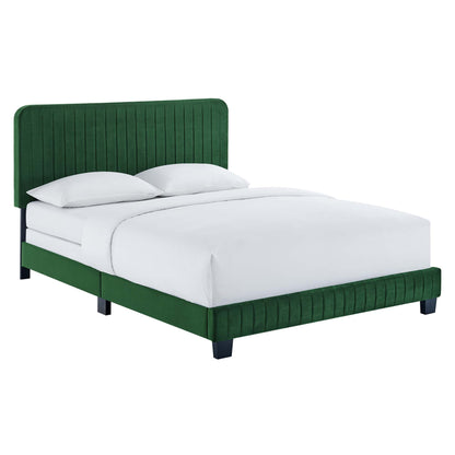 Green velvet upholstered queen bed with tall, vertical-channel tufted headboard & footboard, white sheets.