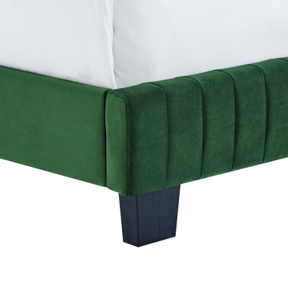 Emerald green velvet bed with channel tufted headboard, white pillows, dark square wood legs.