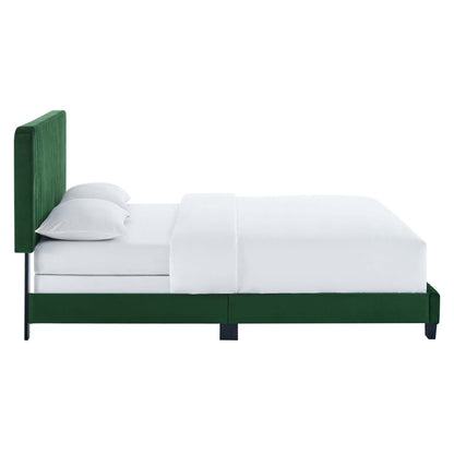 Green velvet upholstered bed with a tall tufted channel headboard, white linens and two pillows, dark legs, modern luxury style.