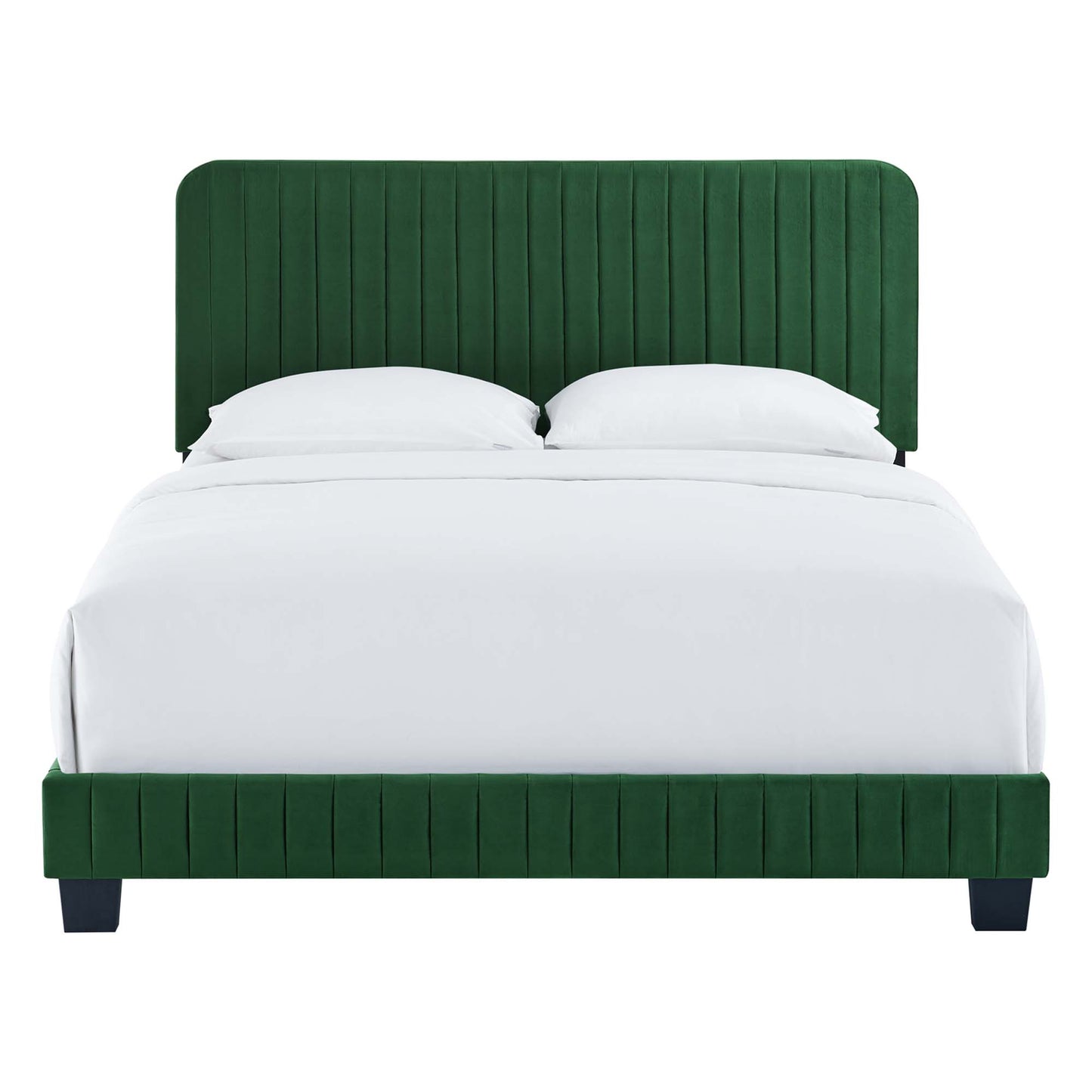 Emerald green velvet platform bed with tall, vertical-channel tufted headboard and dark legs, white bedding.