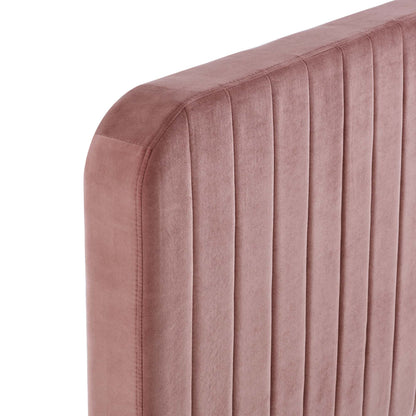 Dusty-rose velvet upholstered twin bed with a headboard featuring vertical channel tufting and rounded corners.