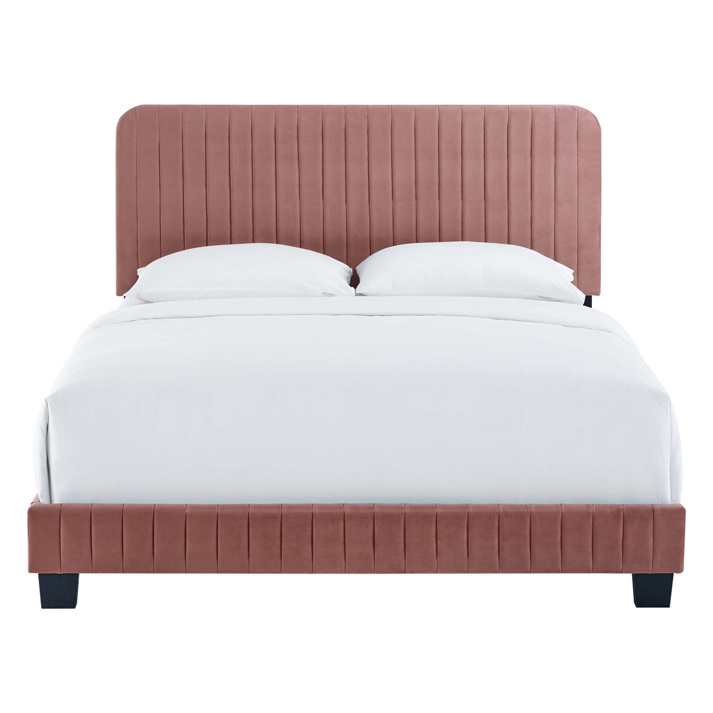 Dusty rose velvet upholstered bed with tall, channel-tufted headboard and low footboard, white bedding.