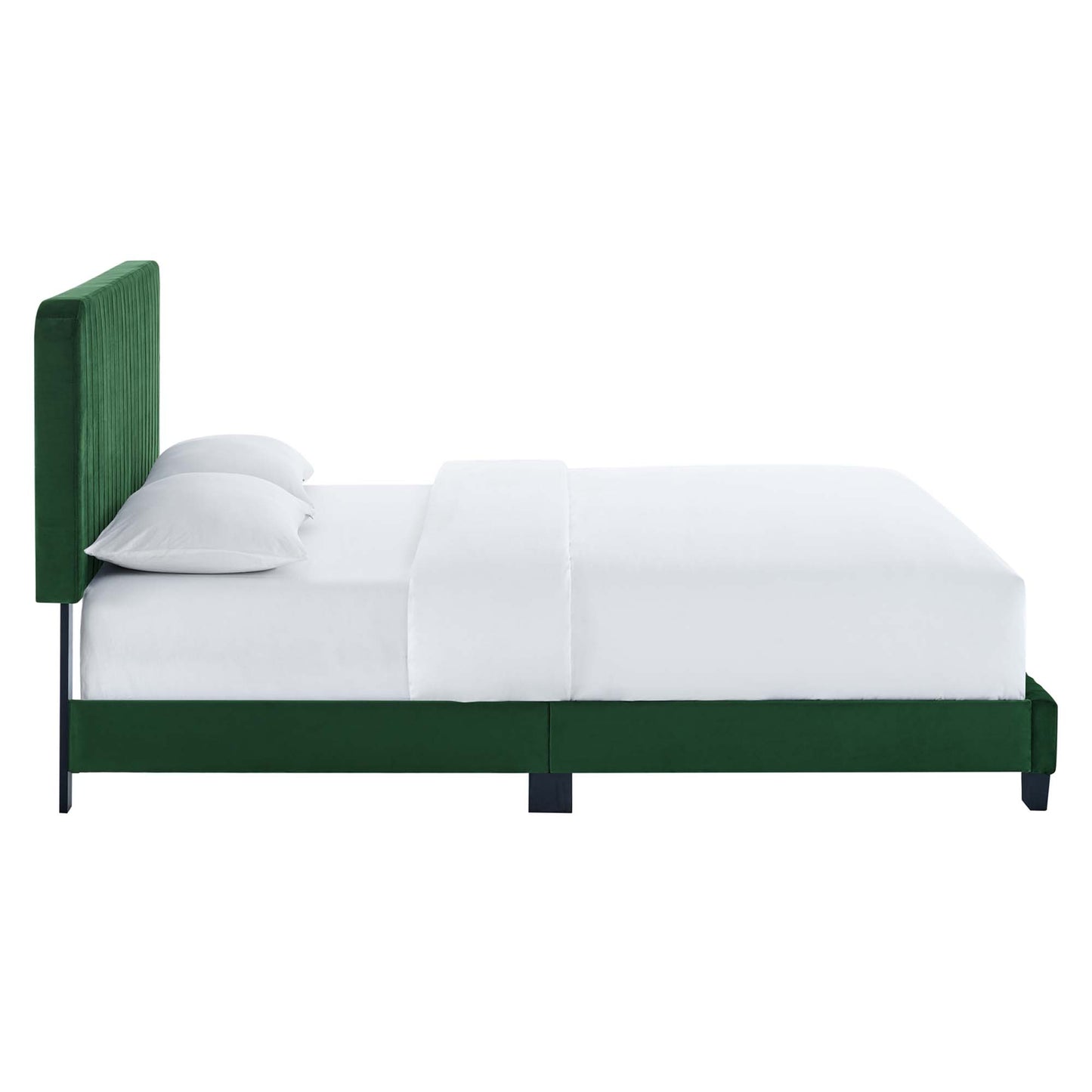 Green velvet headboard & platform bed frame with dark legs, white bedding for a modern, contemporary look.