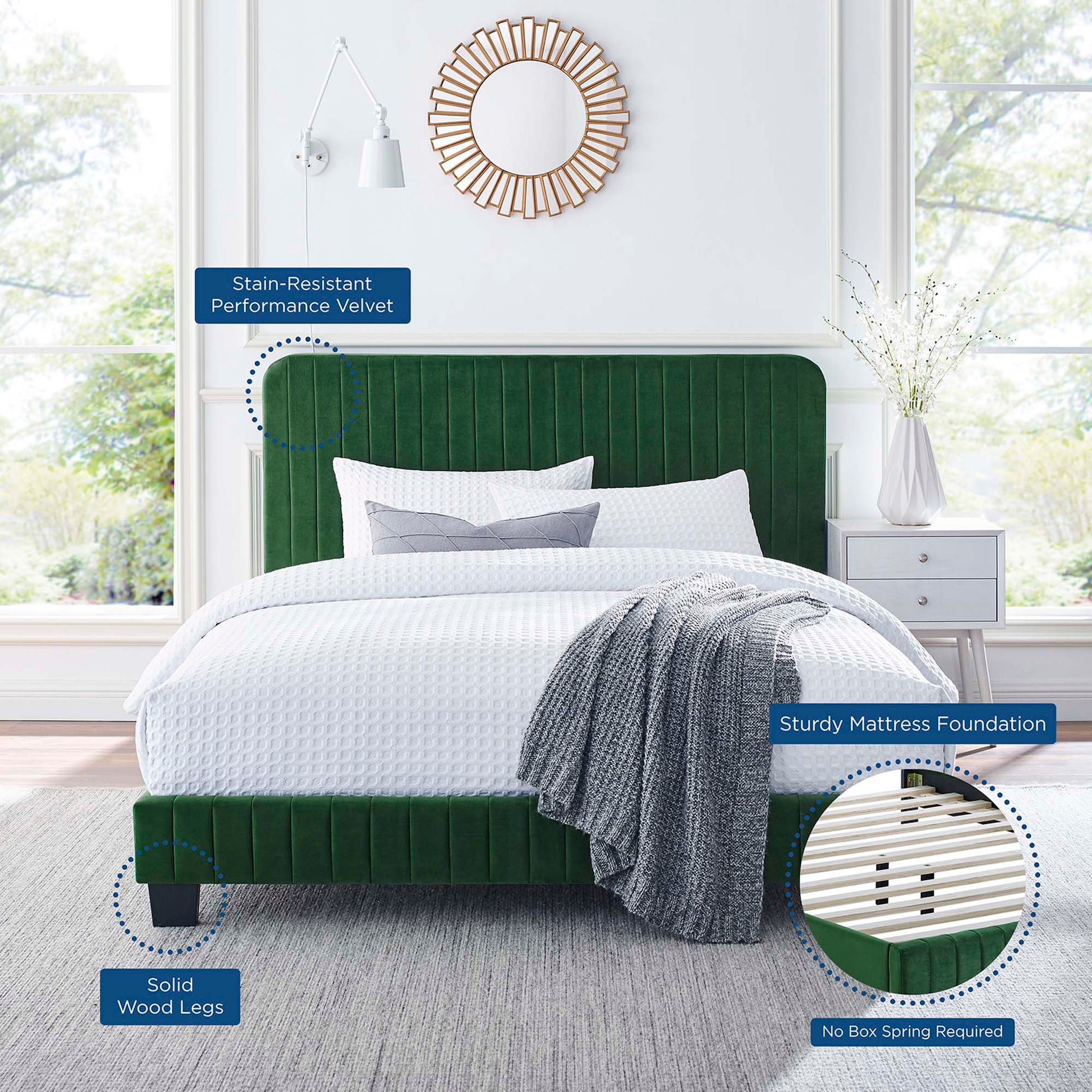 Emerald green velvet upholstered platform bed with tall tufted headboard, solid wood legs and white bedding.